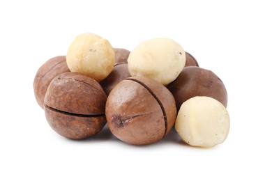 Macadamia nuts with shells isolated on white