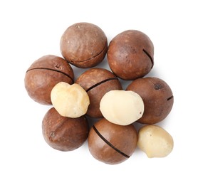 Macadamia nuts with shells isolated on white, top view