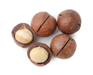 Macadamia nuts with shells isolated on white, top view