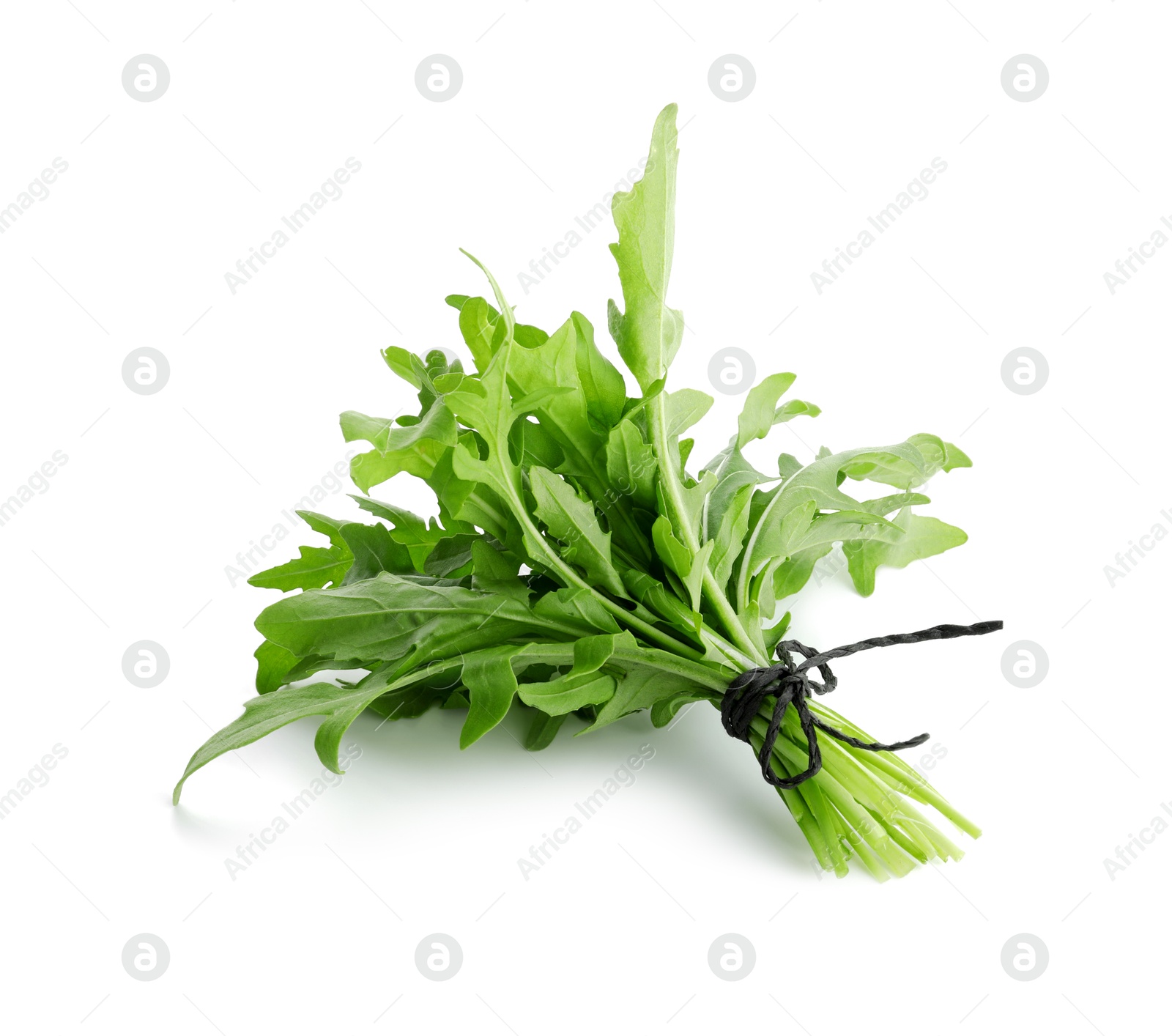 Photo of Bunch of fresh arugula leaves isolated on white