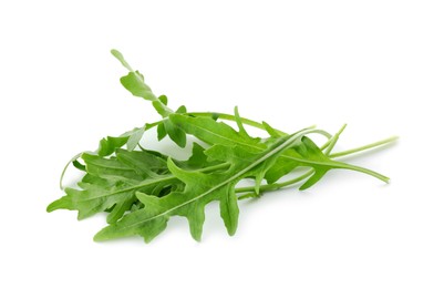 Photo of Many fresh arugula leaves isolated on white