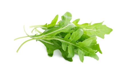 Photo of Many fresh arugula leaves on white background