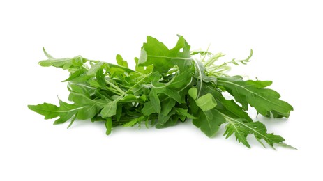 Photo of Pile of fresh arugula leaves isolated on white