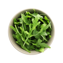 Photo of Fresh arugula leaves in bowl isolated on white, top view