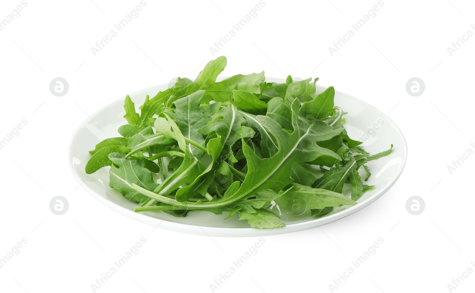 Photo of Plate with fresh arugula leaves isolated on white