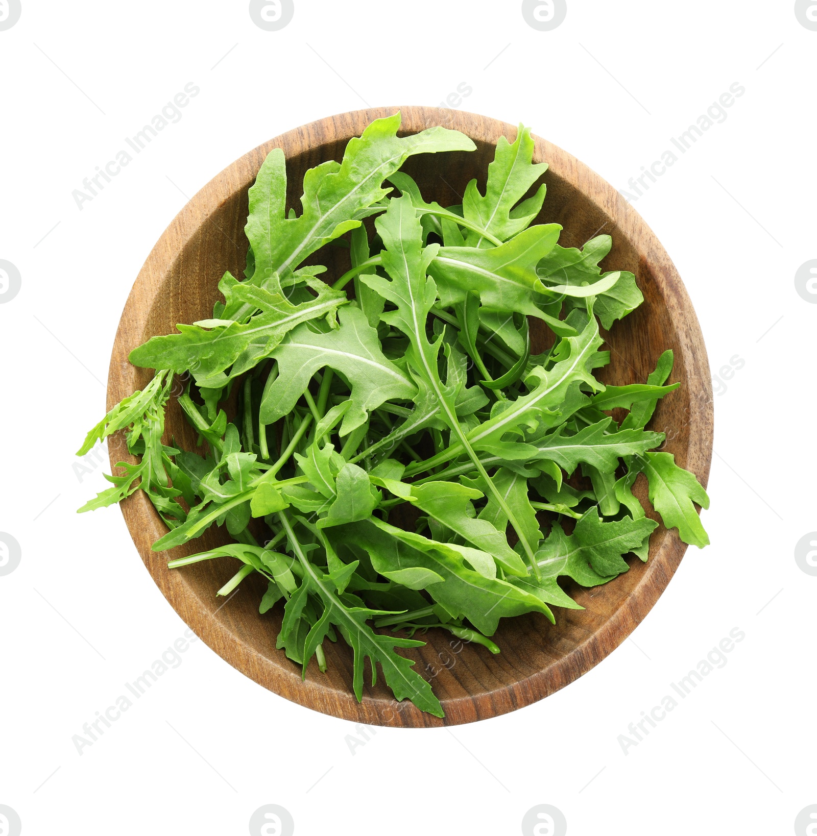 Photo of Fresh arugula leaves in bowl isolated on white, top view