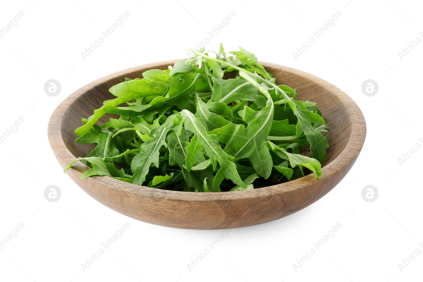 Photo of Fresh arugula leaves in bowl isolated on white