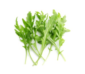 Photo of Fresh arugula leaves isolated on white, top view