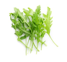 Photo of Fresh arugula leaves isolated on white, top view