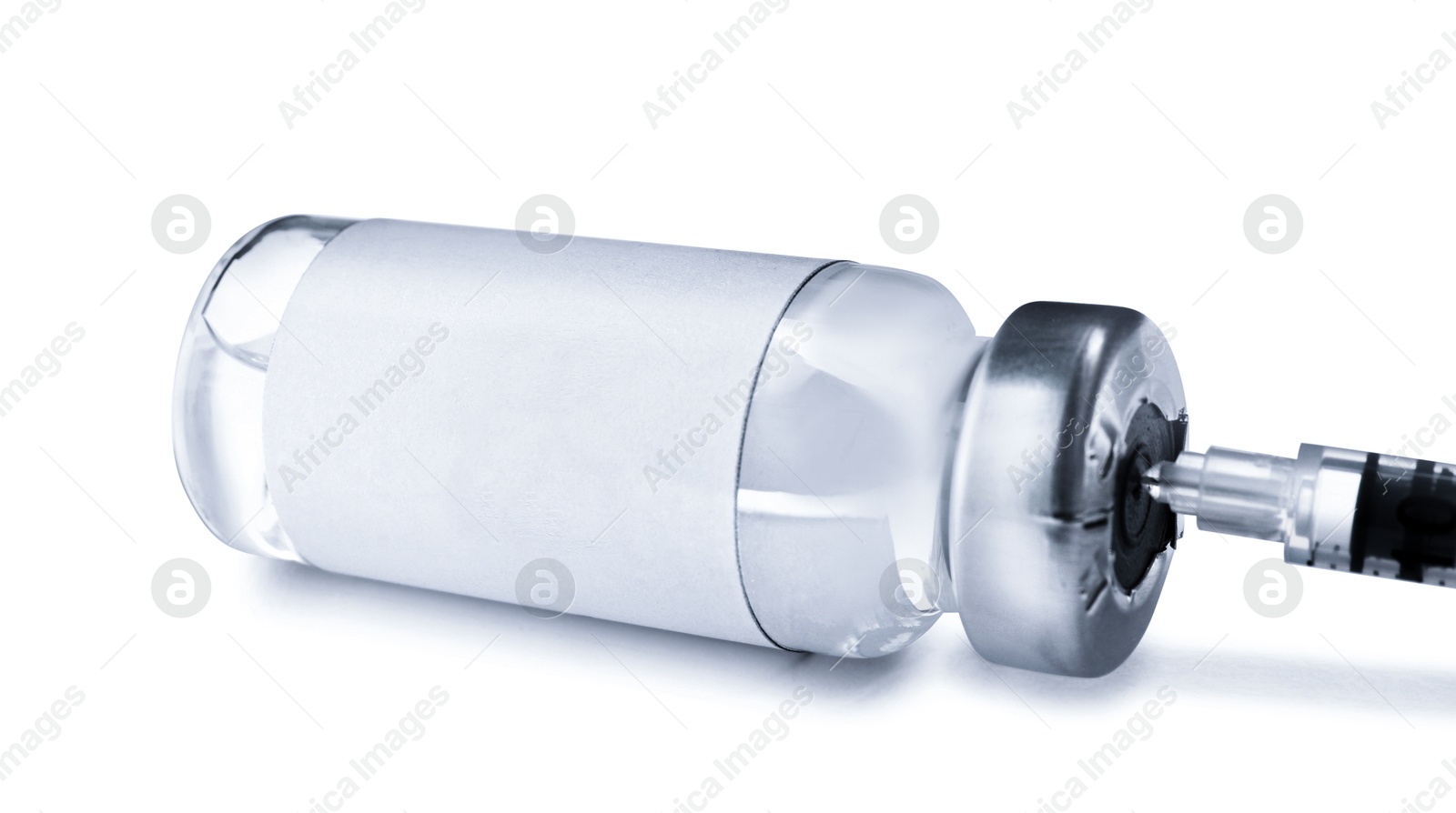 Image of Filling syringe with medication from vial isolated on white