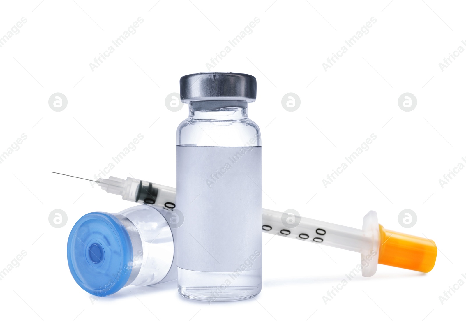 Image of Medication in vials and syringe on white background