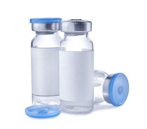 Image of Medication in glass vials on white background