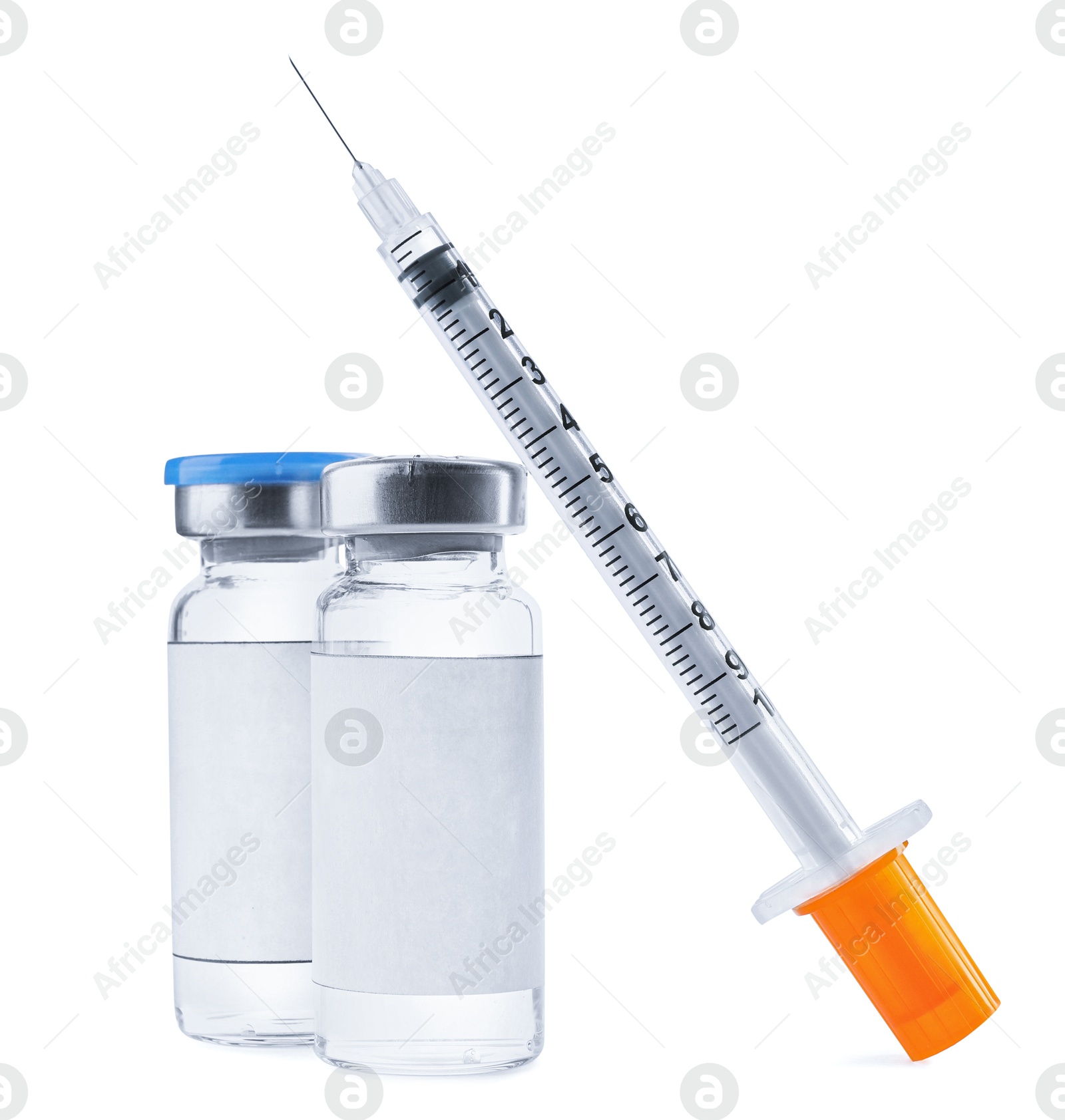 Image of Medication in glass vials with blank labels and syringe on white background