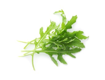 Photo of Fresh arugula leaves isolated on white, above view