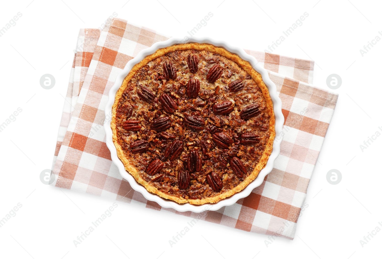 Photo of Delicious pecan pie in baking dish isolated on white, top view