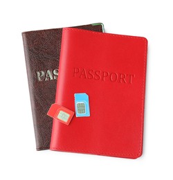 Photo of Passports and SIM cards isolated on white, top view