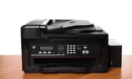 Photo of One modern printer on wooden table against white background