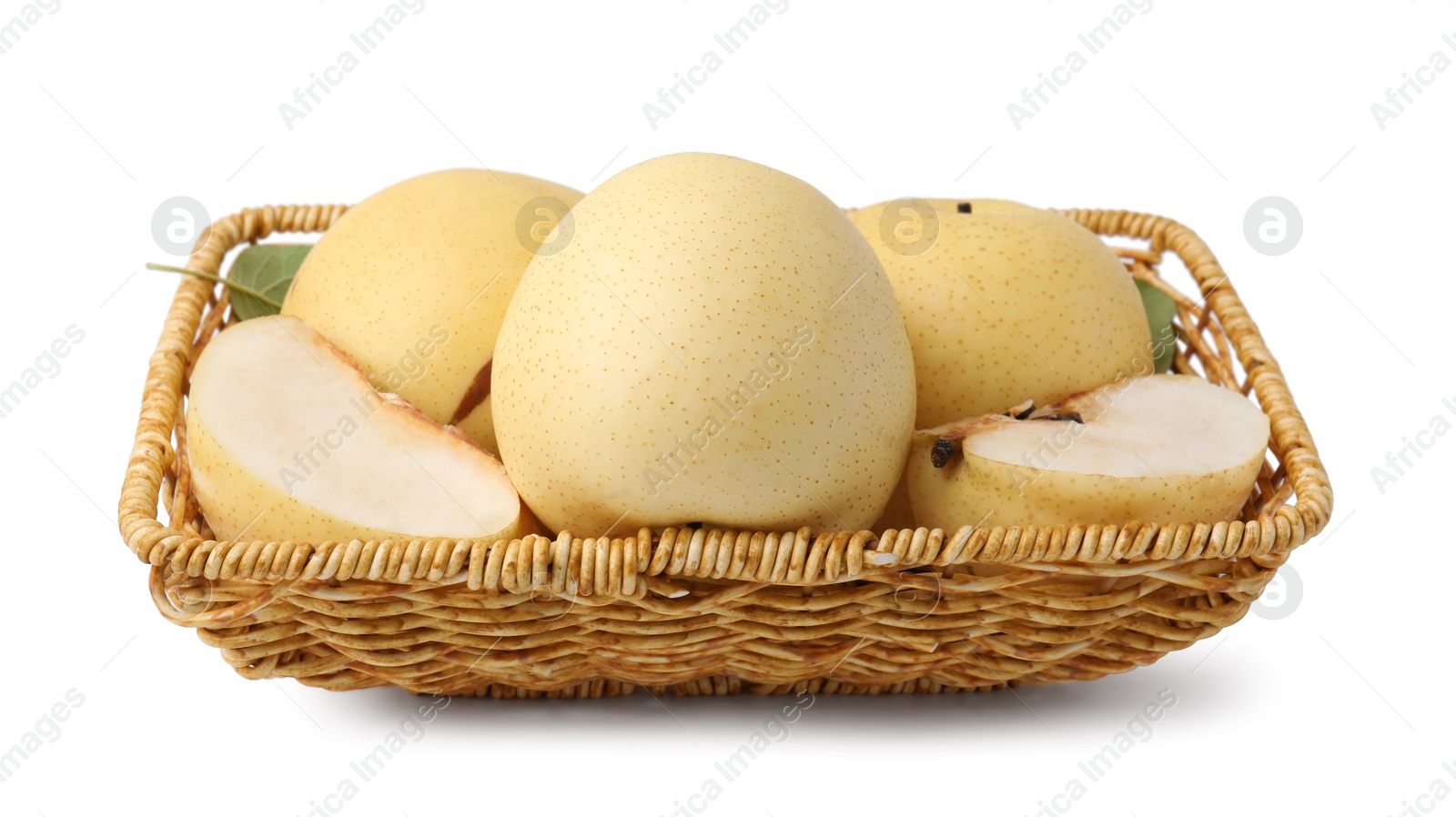 Photo of Delicious fresh apple pears in wicker basket isolated on white