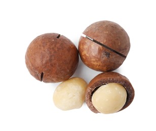 Macadamia nuts with shells isolated on white, top view