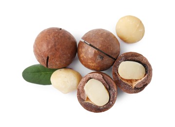 Macadamia nuts with shells isolated on white, top view