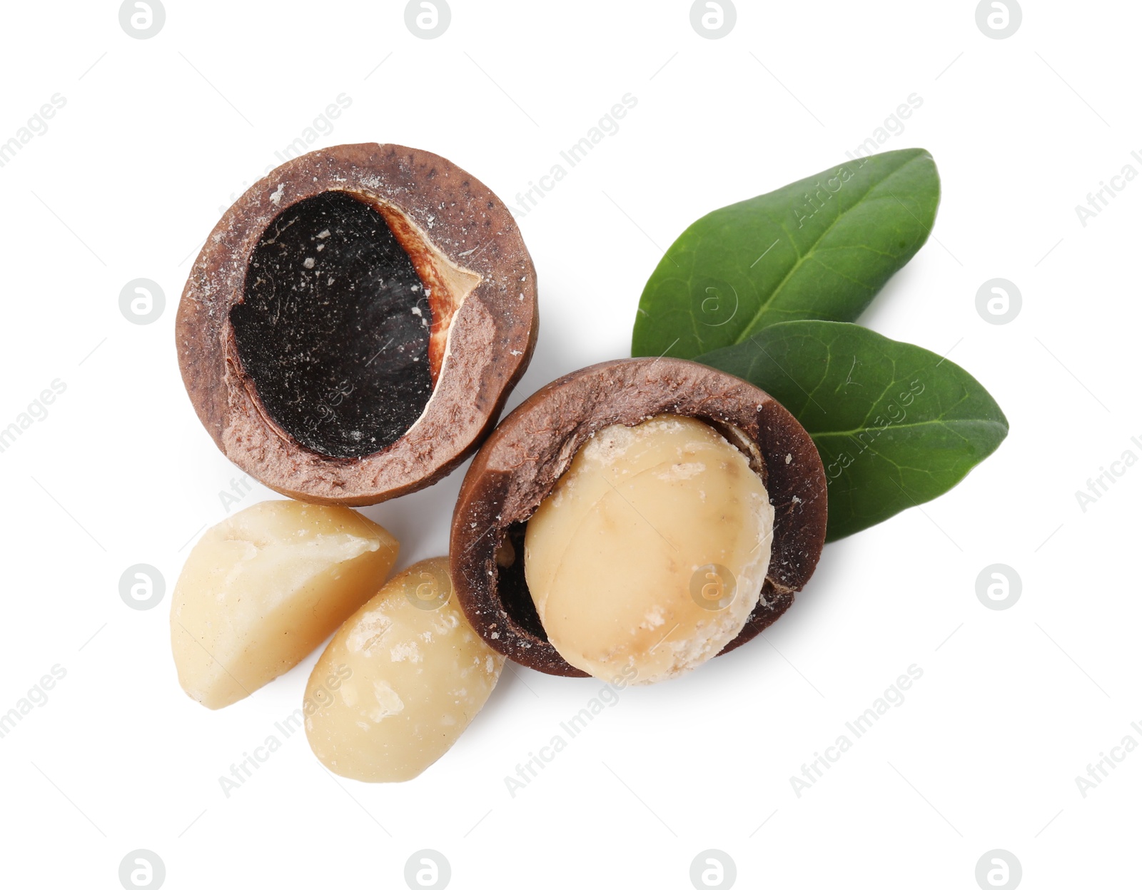 Photo of Macadamia nuts with shells isolated on white, top view