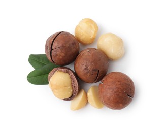 Macadamia nuts with shells isolated on white, top view