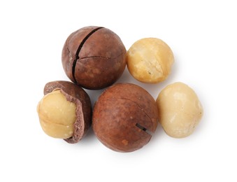 Macadamia nuts with shells isolated on white, top view