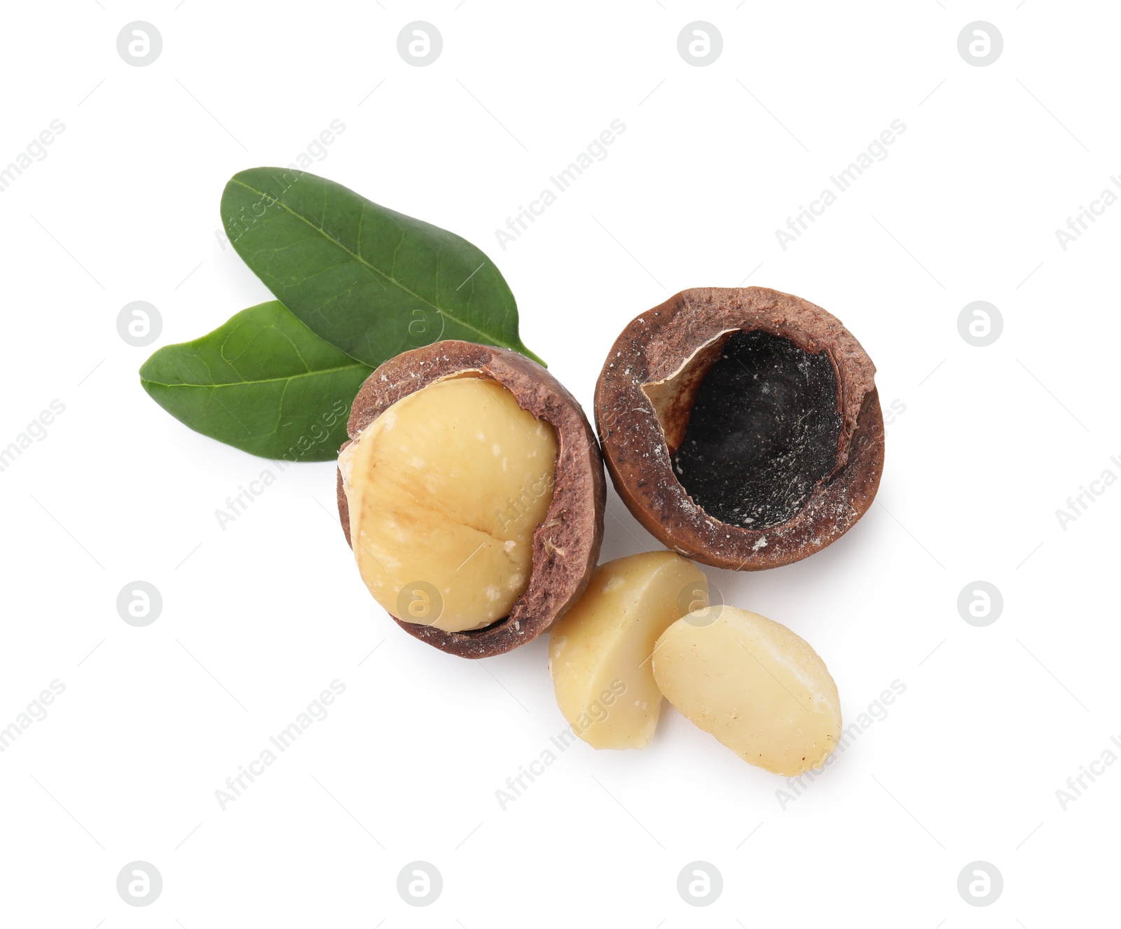 Photo of Macadamia nuts with shells isolated on white, top view