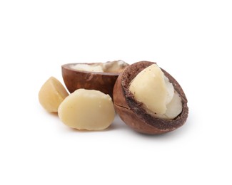 Macadamia nuts with shells isolated on white