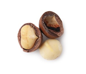 Macadamia nuts with shells isolated on white, top view