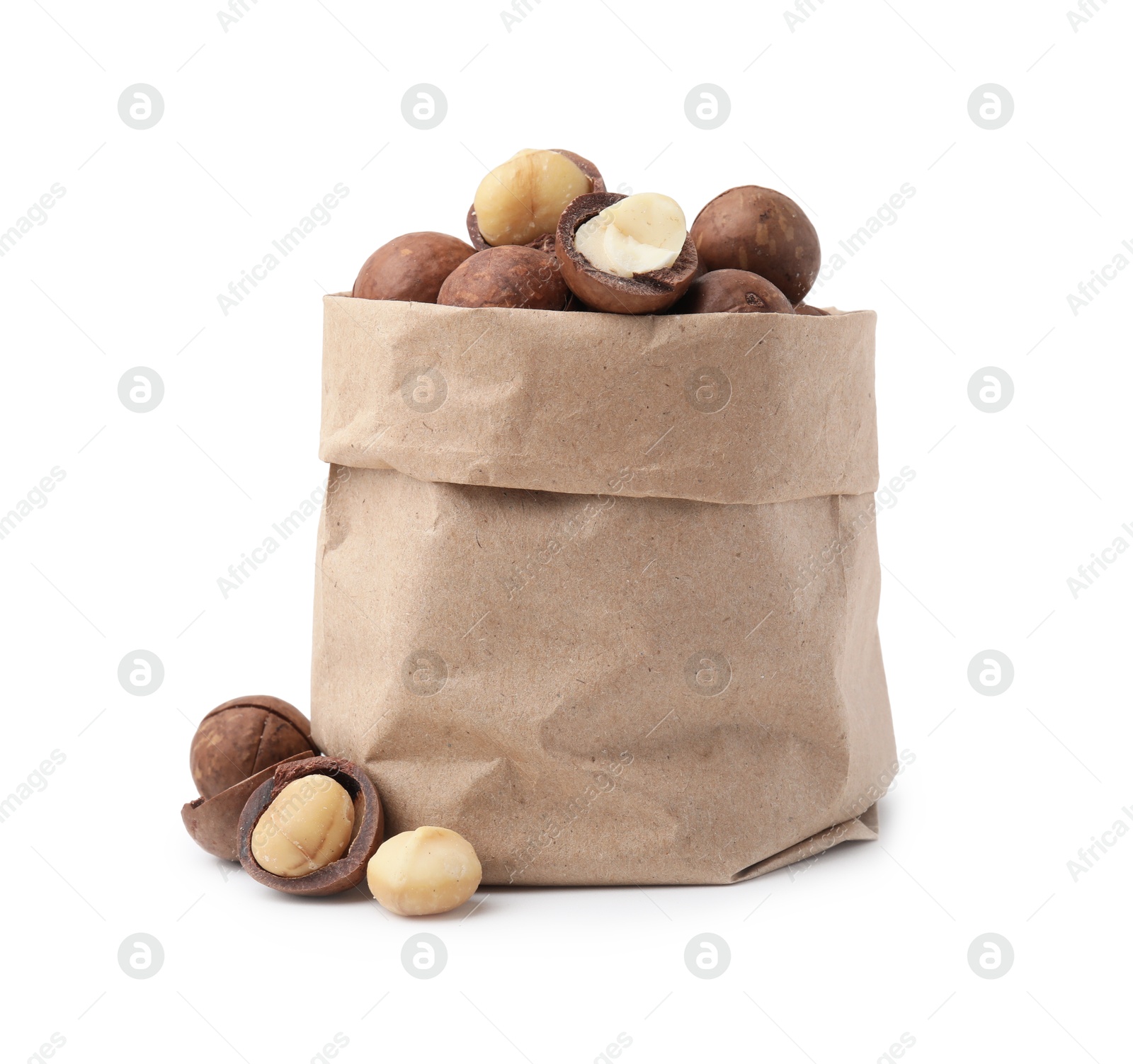 Photo of Macadamia nuts in paper bag isolated on white