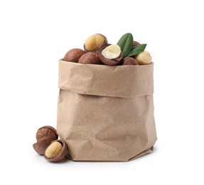 Photo of Macadamia nuts in paper bag isolated on white