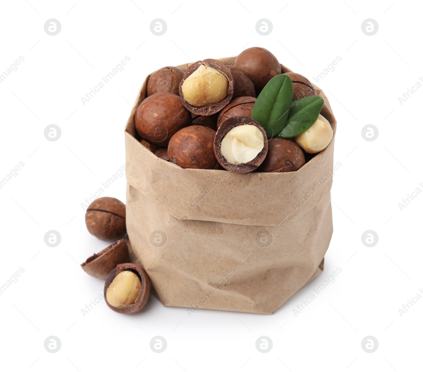 Photo of Macadamia nuts in paper bag isolated on white