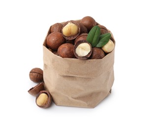 Photo of Macadamia nuts in paper bag isolated on white