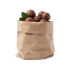 Photo of Macadamia nuts in paper bag isolated on white