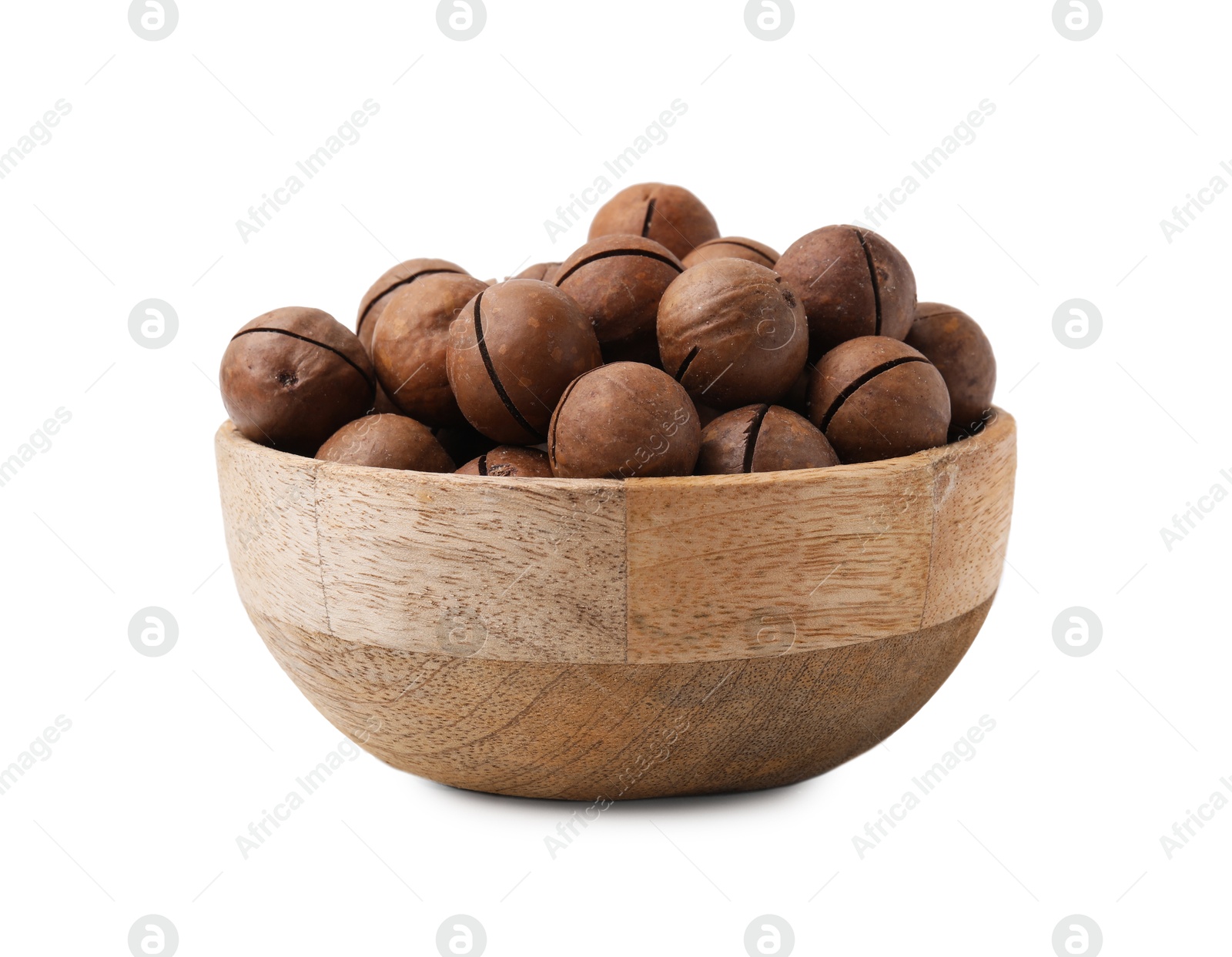 Photo of Macadamia nuts in bowl isolated on white