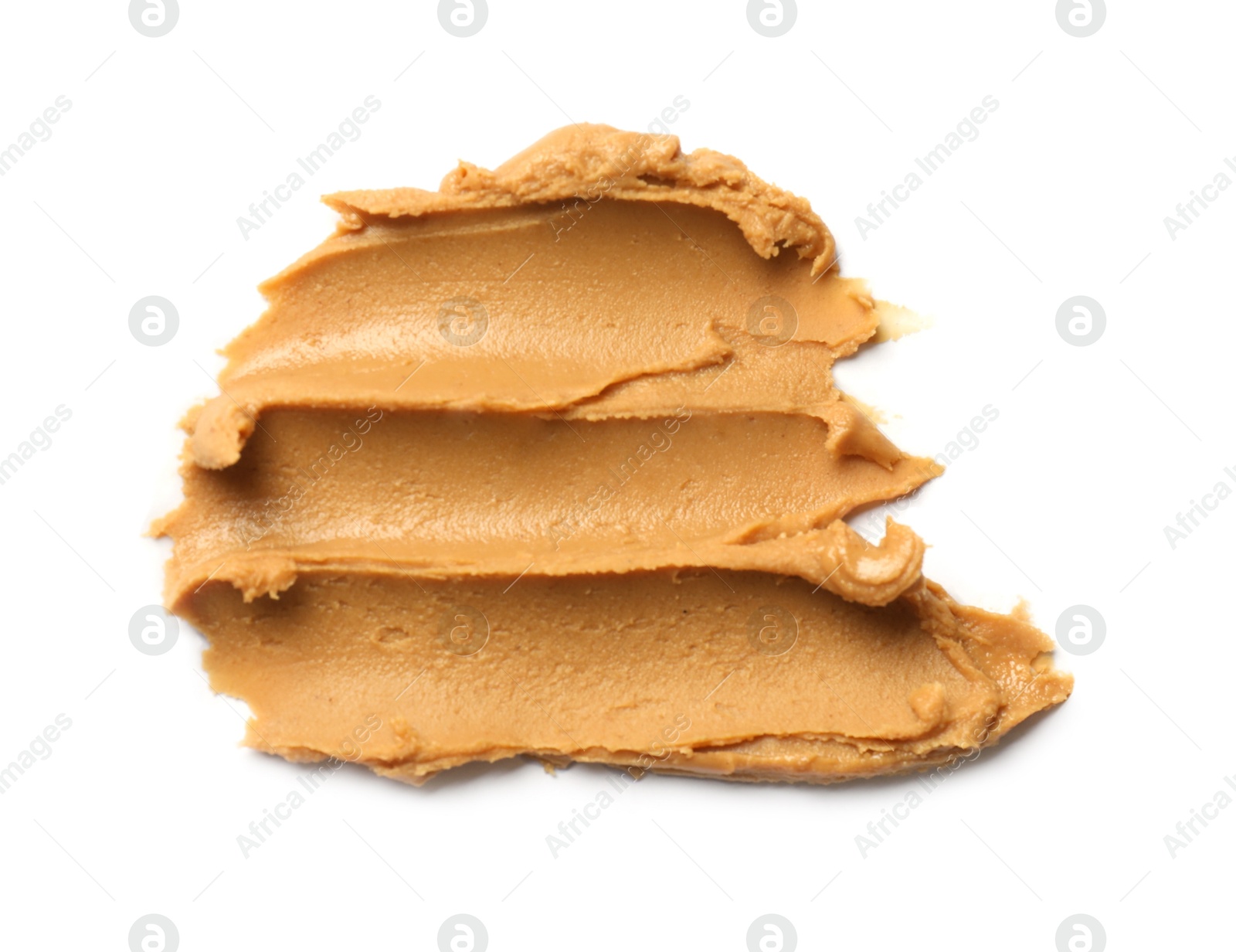 Photo of Tasty peanut butter on white background, top view