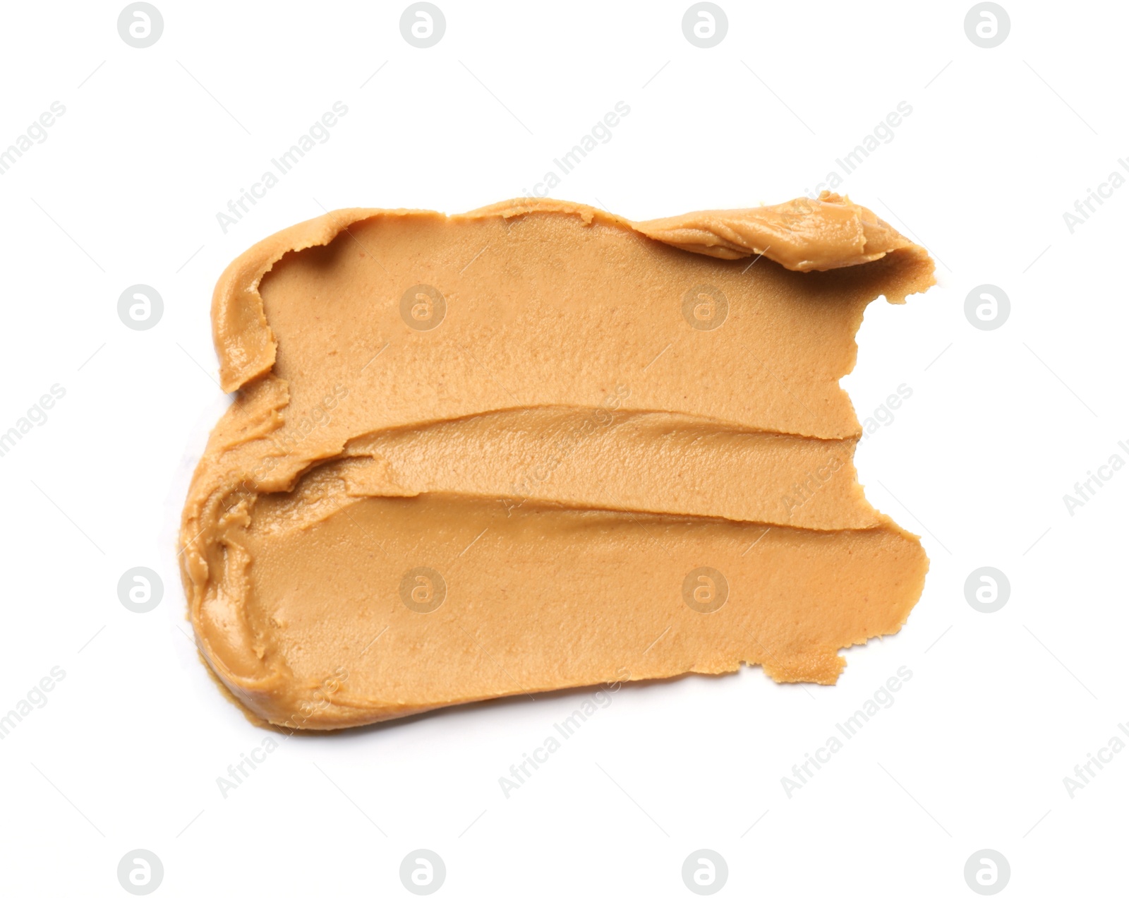 Photo of Tasty peanut butter on white background, top view