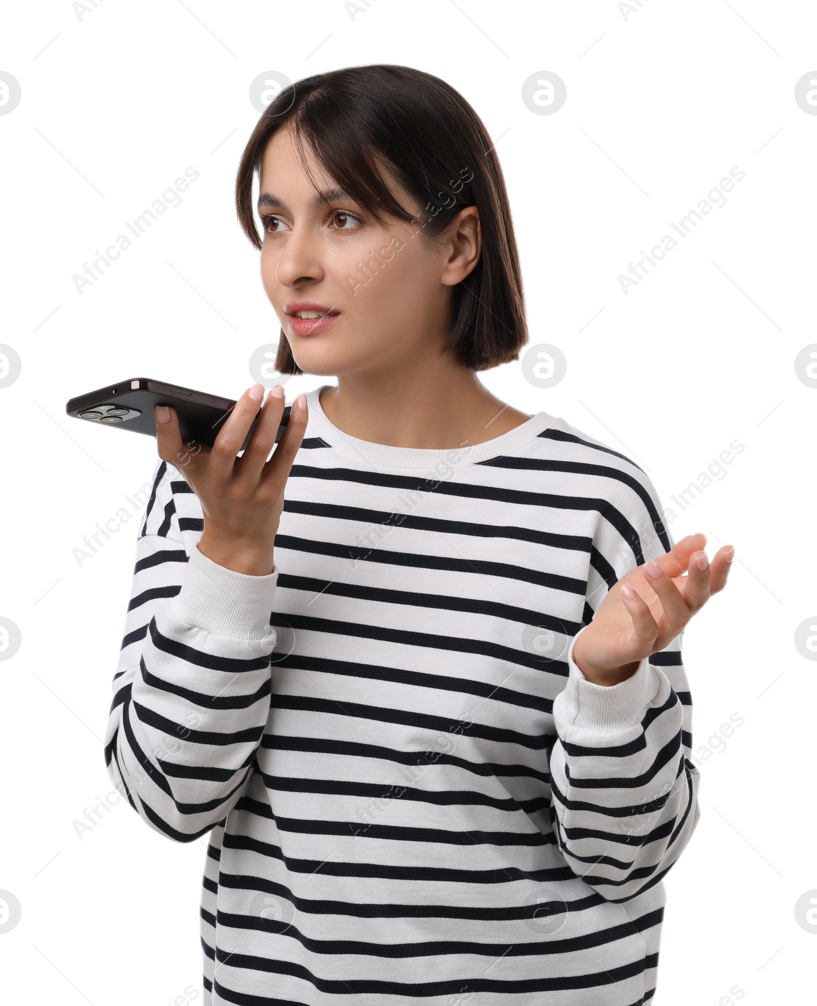 Photo of Beautiful woman recording voice message via smartphone on white background