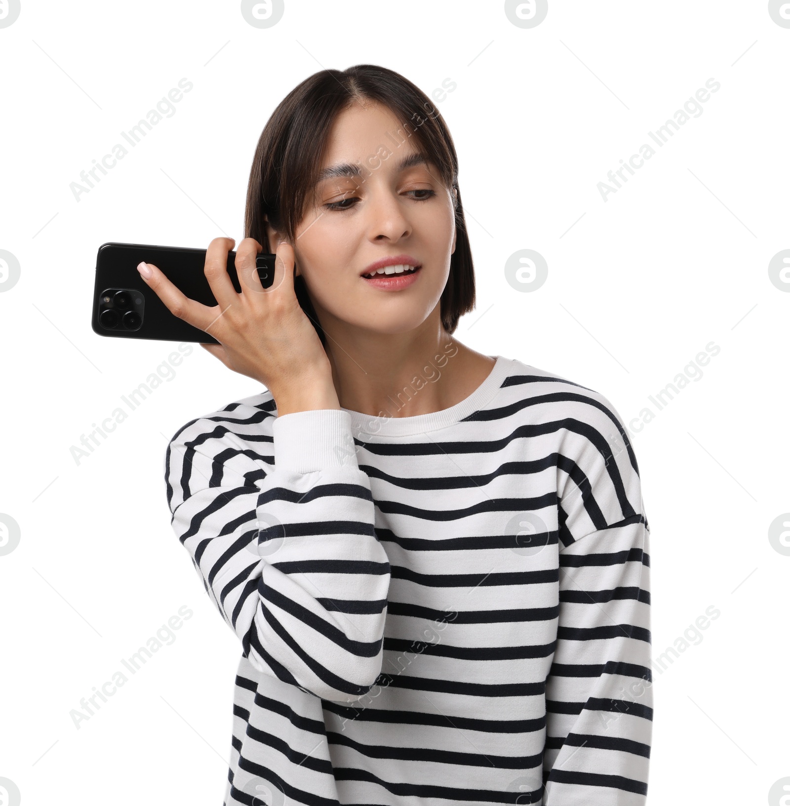 Photo of Beautiful woman with smartphone listening to voice message on white background