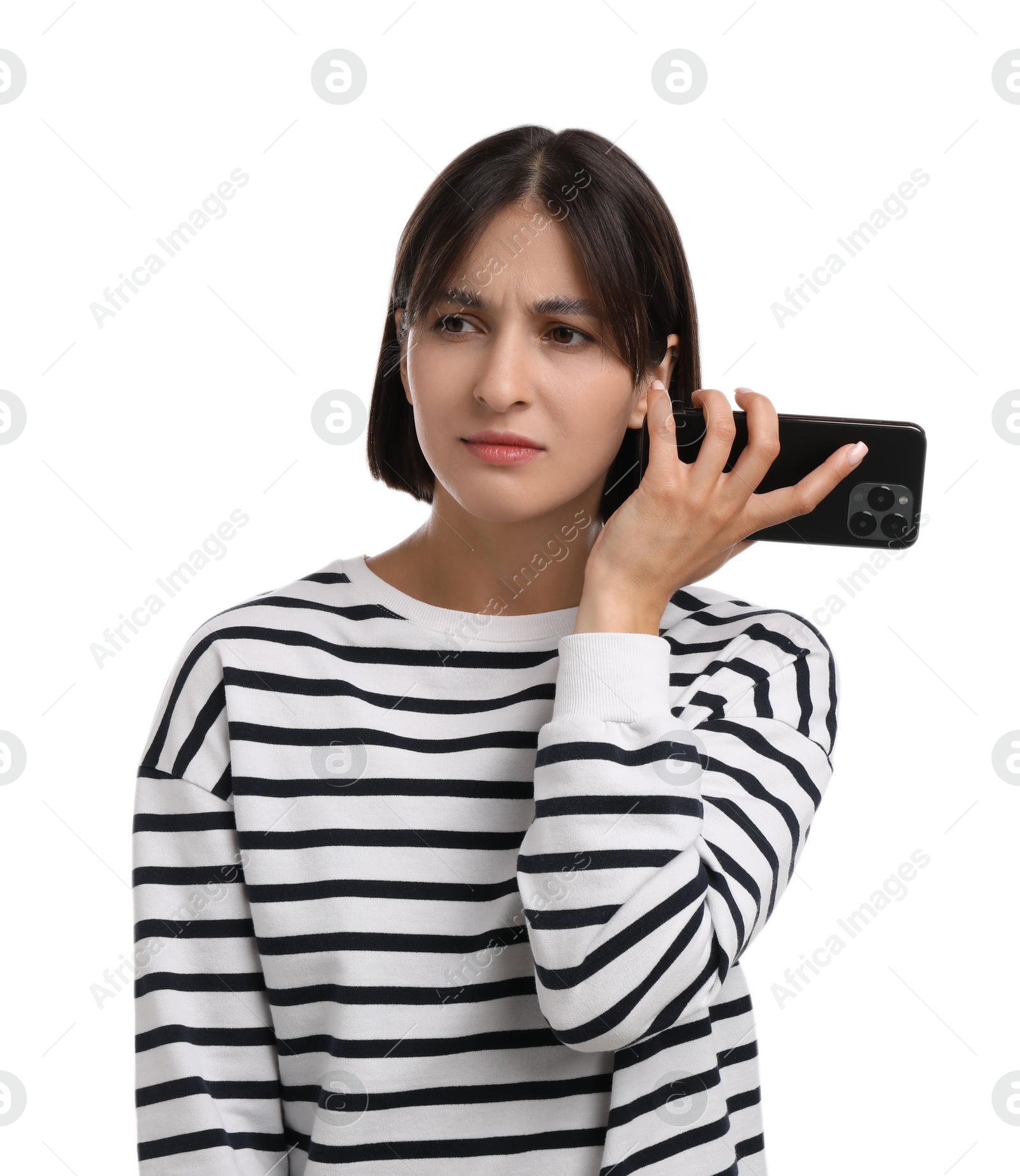 Photo of Beautiful woman with smartphone listening to voice message on white background