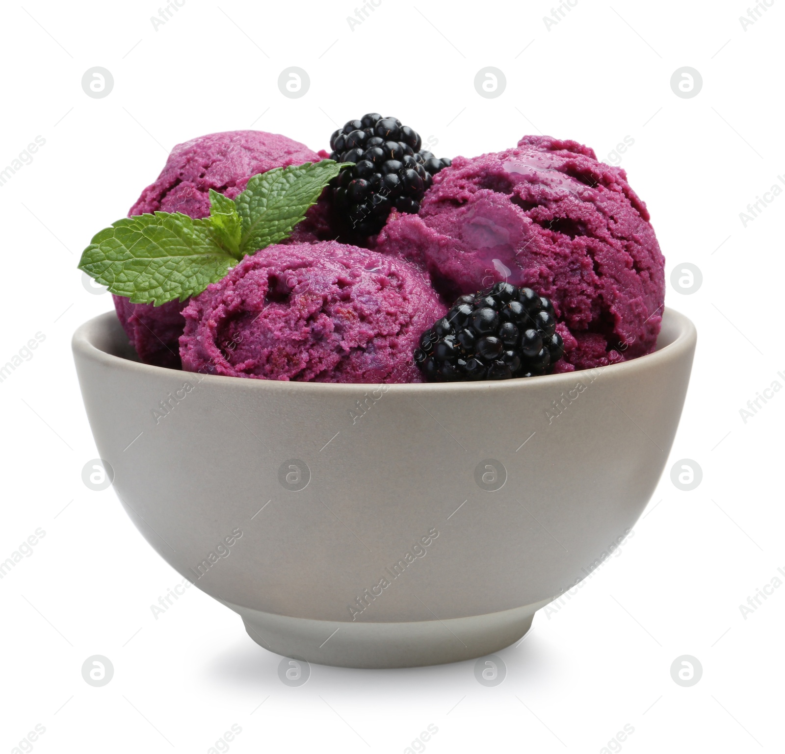 Photo of Delicious blackberry sorbet, mint and fresh berries isolated on white