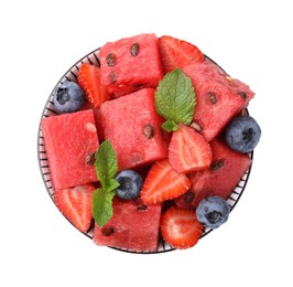 Pieces of tasty watermelon, strawberries, blueberries and mint in bowl isolated on white, top view