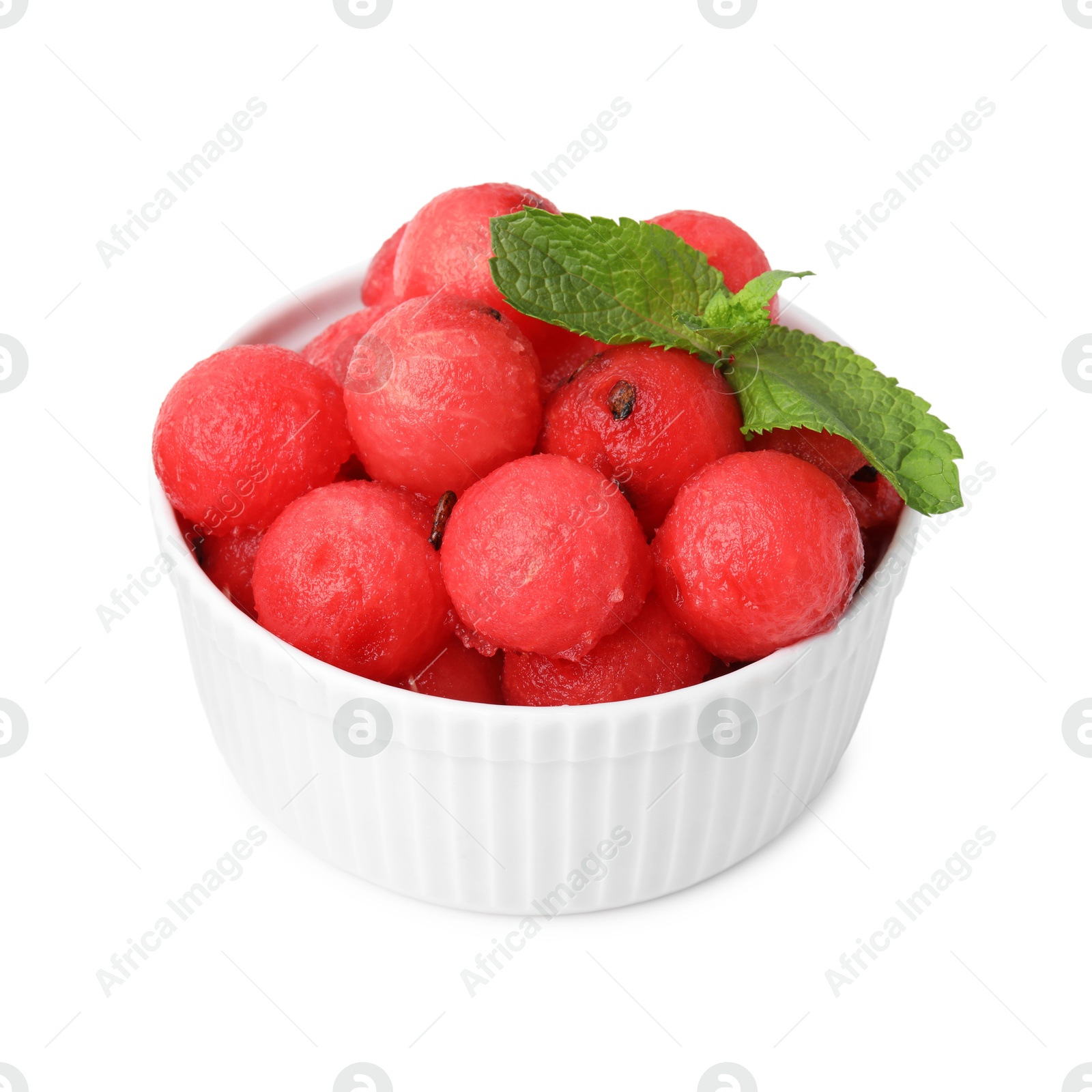 Photo of Tasty watermelon balls and mint in bowl isolated on white