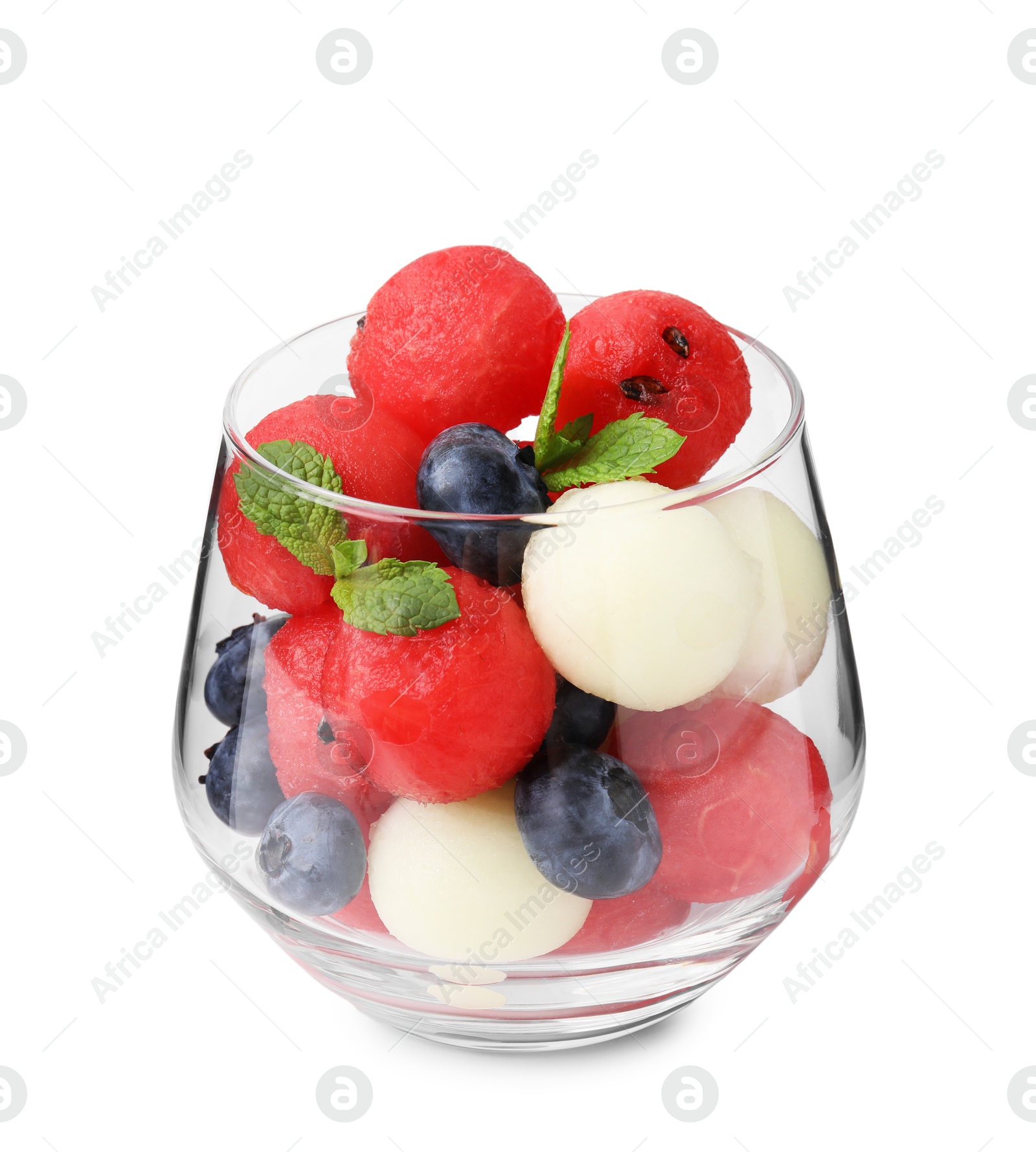 Photo of Tasty watermelon and melon balls with blueberries in glass isolated on white