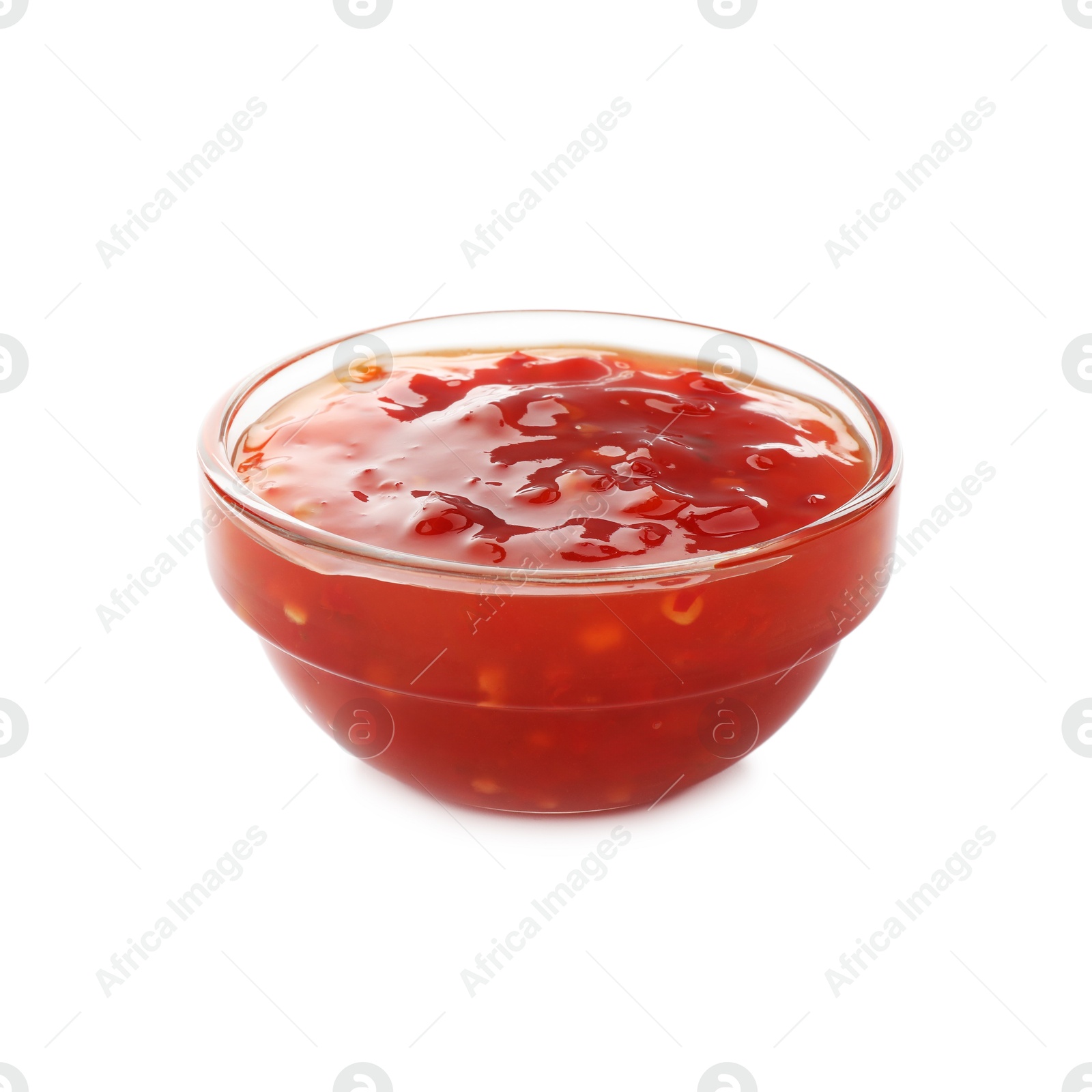 Photo of Hot chili sauce in bowl isolated on white