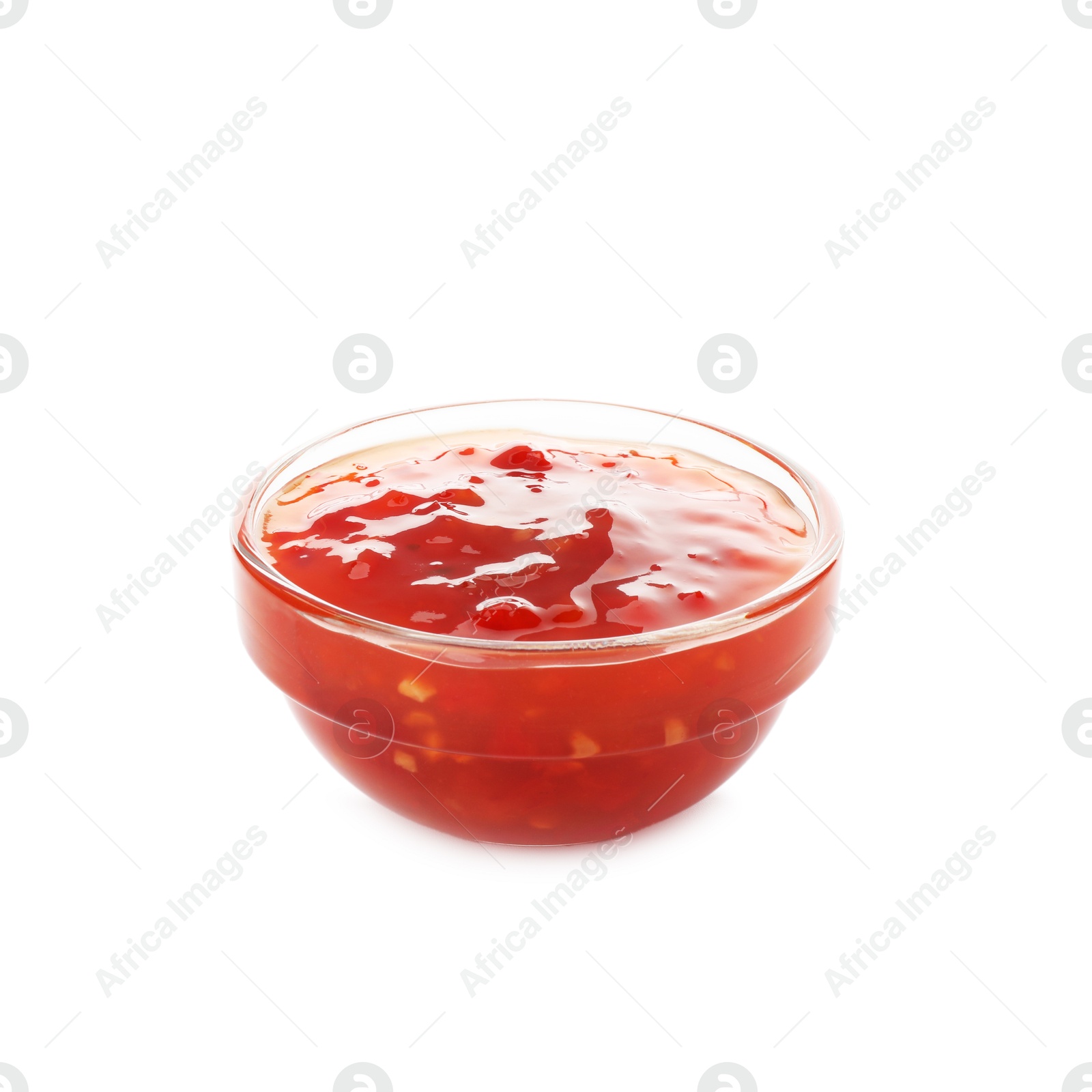 Photo of Hot chili sauce in bowl isolated on white