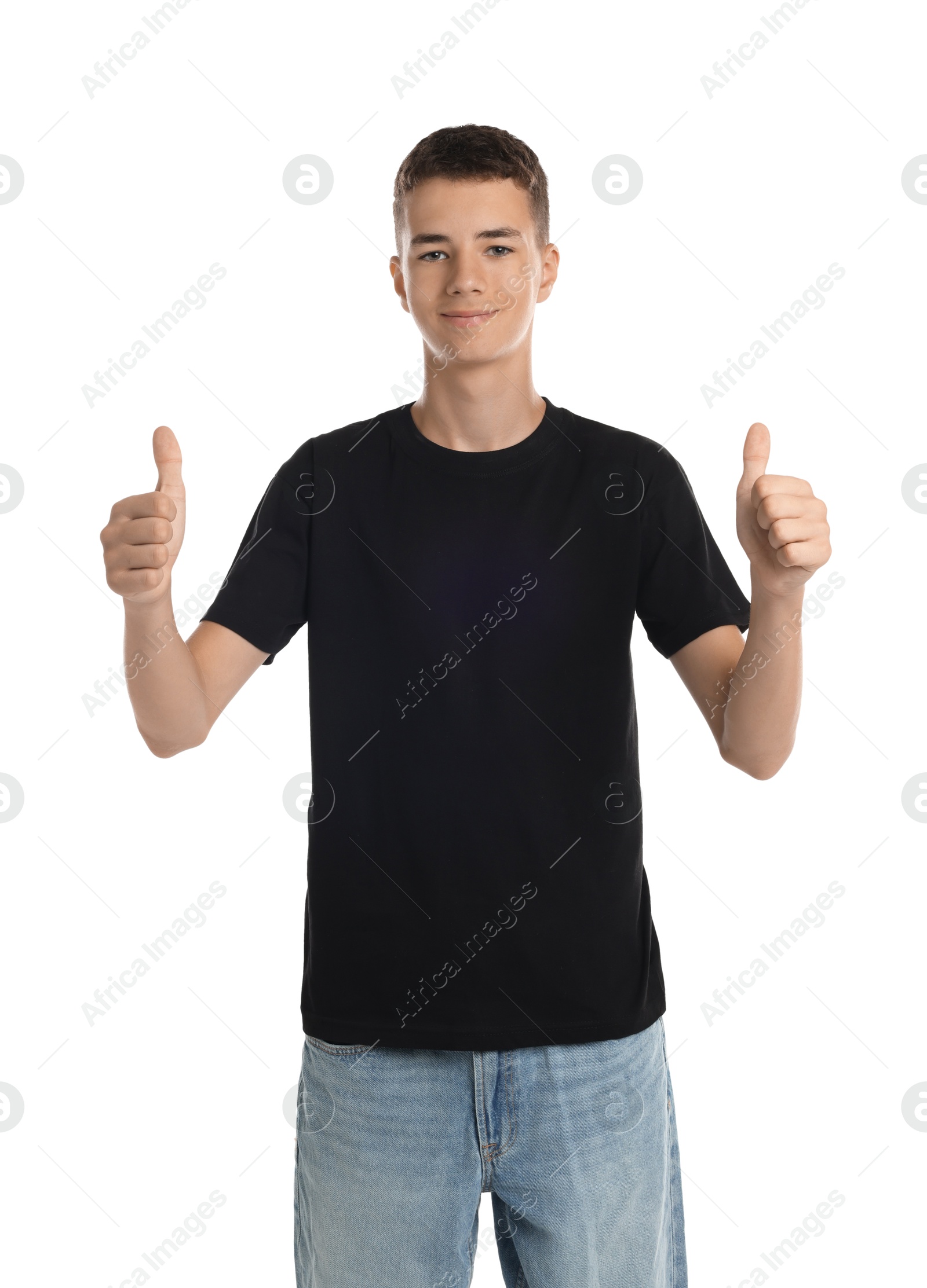 Photo of Teenage boy wearing black t-shirt and showing thumbs up on white background