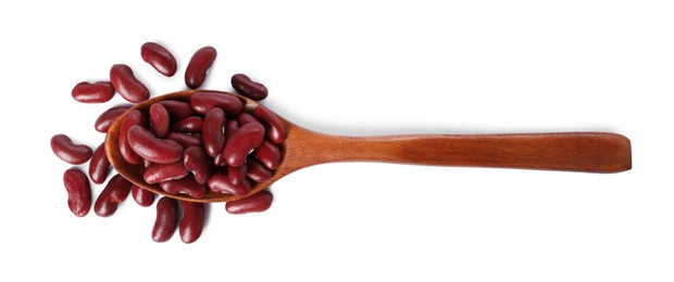 Dried red beans in spoon isolated on white, top view