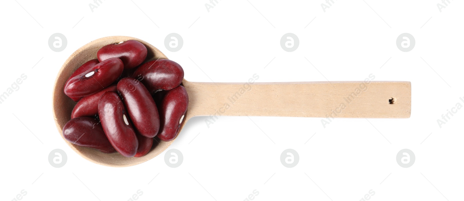 Photo of Dried red beans in spoon isolated on white, top view